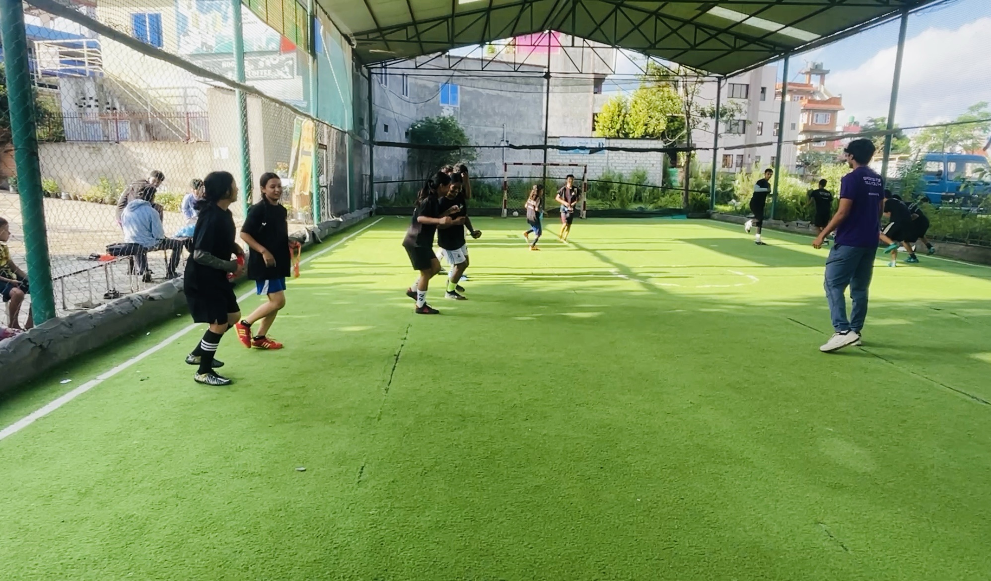 Alan Risal and HYAF Sports wellness clinic fun pushing game